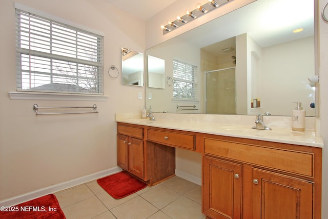 bathroom featuring tile patterned flooring, vanity, and an enclosed shower