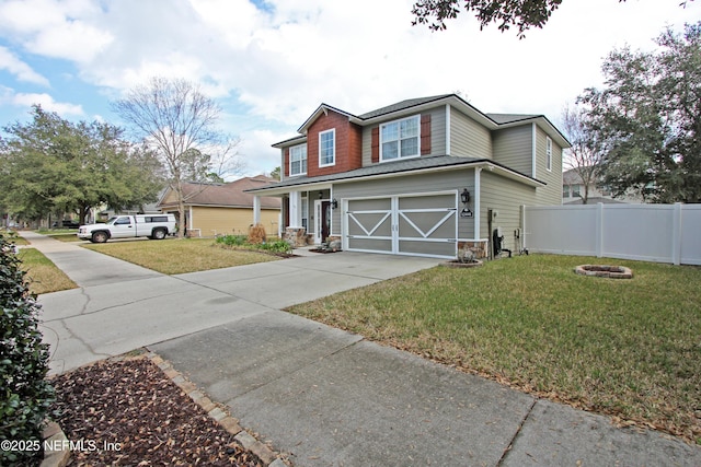 view of front of house with a garage and a front lawn