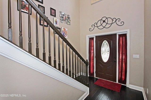 foyer entrance featuring hardwood / wood-style floors