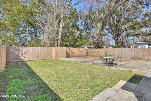 view of yard with a patio area