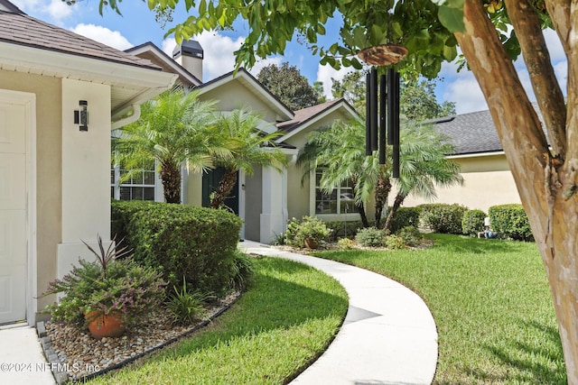 view of front of house with a front lawn