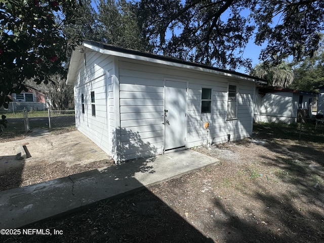 exterior space featuring an outbuilding