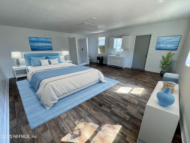 bedroom featuring dark wood-type flooring and sink