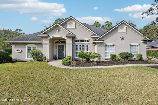 view of front of home with a front yard