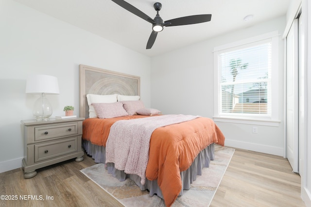 bedroom featuring ceiling fan and light wood-type flooring