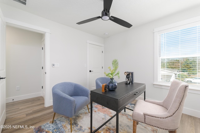 office area featuring hardwood / wood-style flooring and ceiling fan