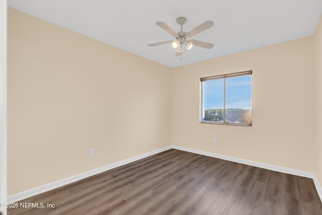 unfurnished room with ceiling fan and wood-type flooring