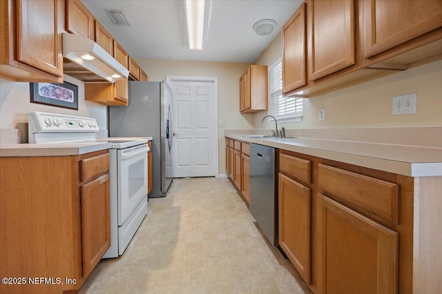 kitchen featuring appliances with stainless steel finishes and sink