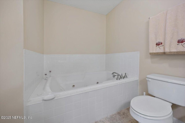 bathroom with a relaxing tiled tub, toilet, and tile patterned flooring