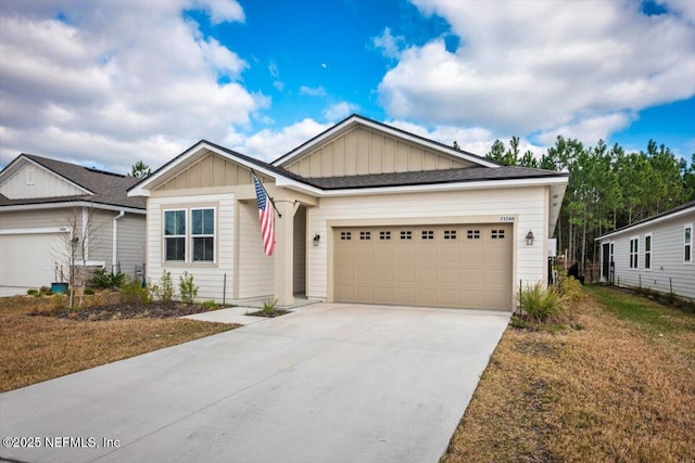 view of front of house featuring a garage and a front yard