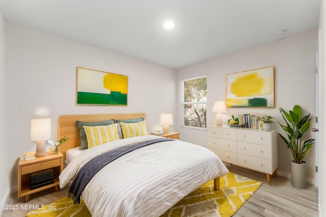 bedroom featuring light hardwood / wood-style floors