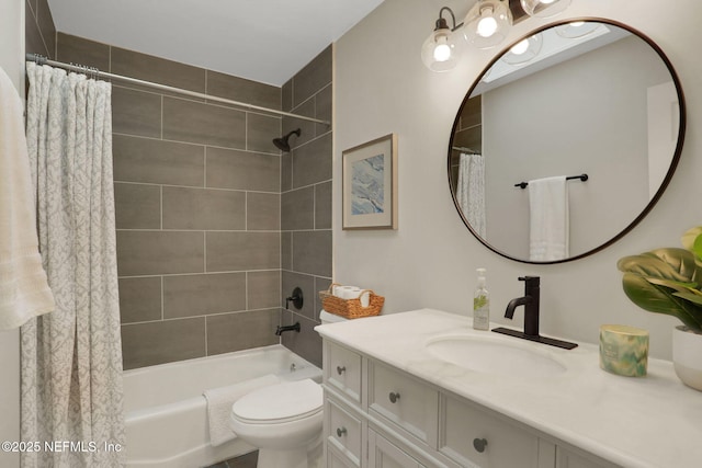 full bathroom featuring vanity, toilet, and shower / bath combo with shower curtain