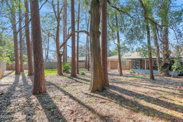 view of yard featuring a sunroom