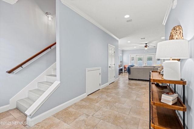 interior space featuring crown molding and ceiling fan