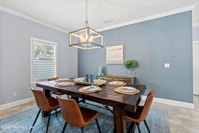 dining area featuring crown molding, a notable chandelier, and baseboards