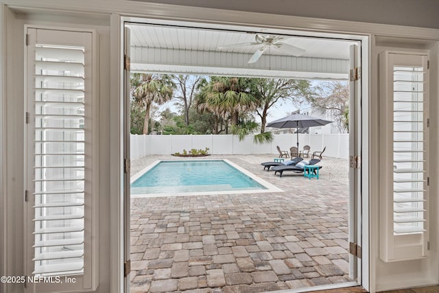 view of pool with ceiling fan