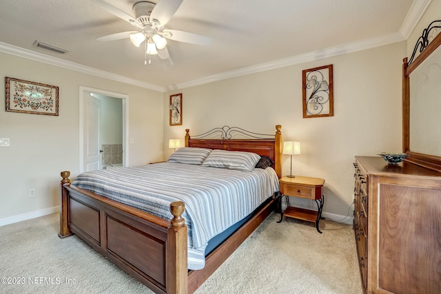 bedroom featuring crown molding, light colored carpet, and ceiling fan