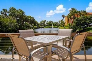 view of patio / terrace featuring a water view