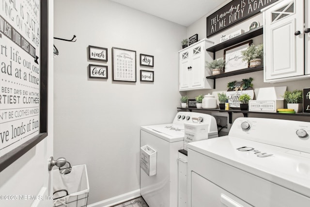 laundry room with cabinets and separate washer and dryer