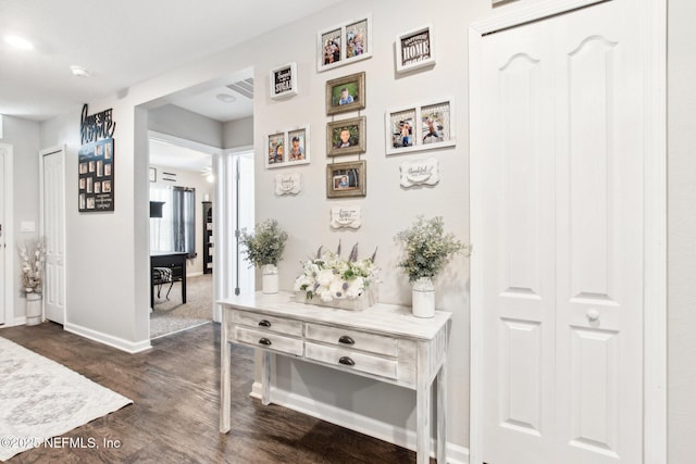 hall featuring dark hardwood / wood-style flooring