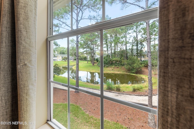 entryway featuring a water view