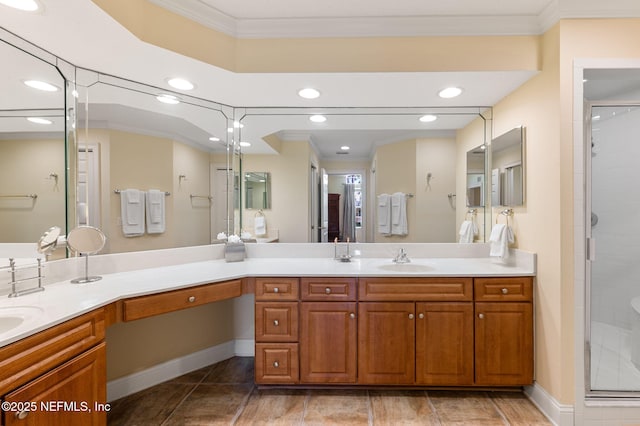 bathroom featuring vanity, crown molding, and walk in shower