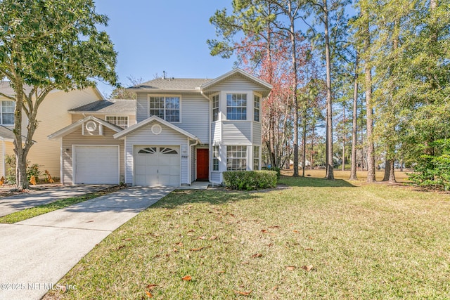 view of front property featuring a garage and a front yard