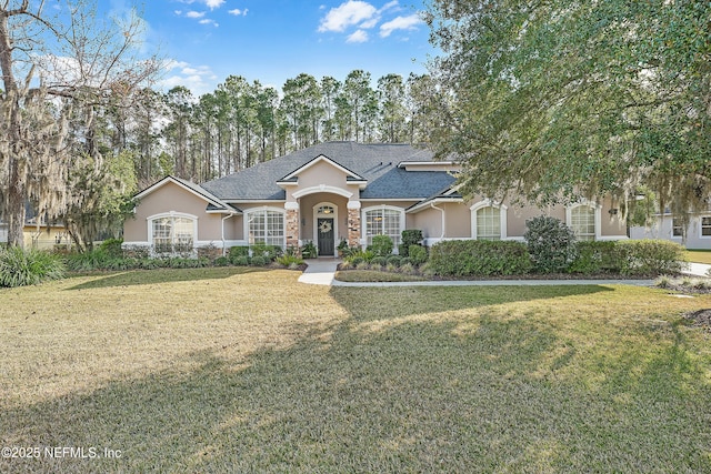 view of front of home with a front yard