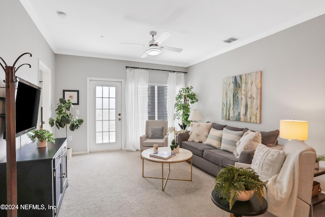 10961 Burnt Mill Rd Unit 425, Jacksonville, FL 32256 - carpeted living room featuring ornamental molding and ceiling fan