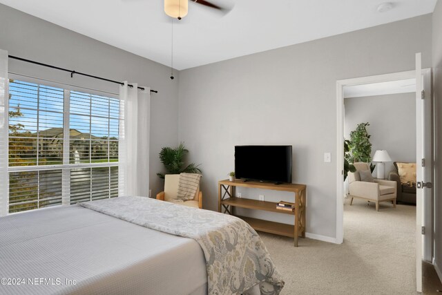 10961 Burnt Mill Rd Unit 425, Jacksonville, FL 32256 - bedroom featuring light colored carpet