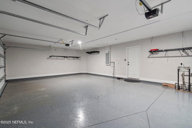 garage with electric panel and a garage door opener