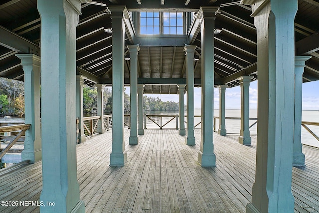 wooden terrace with a water view