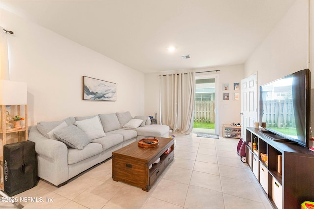 living room with light tile patterned floors