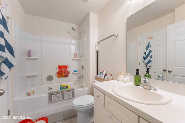 full bathroom with shower / tub combo with curtain, vanity, toilet, and a textured ceiling