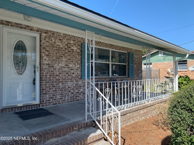 entrance to property with a porch