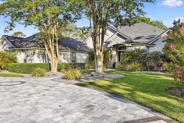 view of front of house with a front lawn