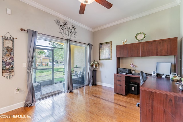 office area featuring light wood finished floors, ceiling fan, baseboards, and crown molding