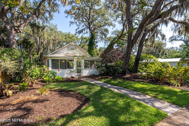 view of front of property with a front lawn