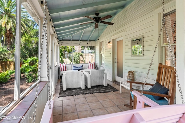 view of patio / terrace with an outdoor living space and ceiling fan