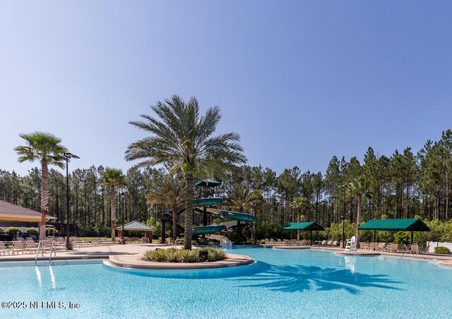 view of swimming pool featuring a gazebo