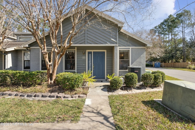 view of front property featuring cooling unit