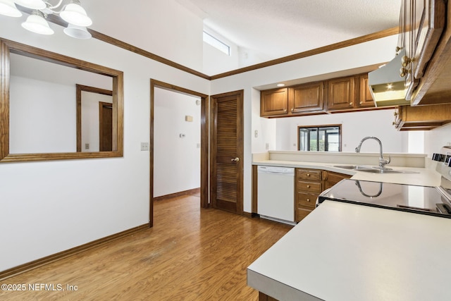10800 Old St Augustine Rd Unit 301, Jacksonville, FL 32257 - kitchen featuring dishwasher, lofted ceiling, sink, range, and light wood-type flooring