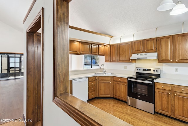 10800 Old St Augustine Rd Unit 301, Jacksonville, FL 32257 - kitchen with sink, stainless steel range with electric cooktop, white dishwasher, a textured ceiling, and light hardwood / wood-style flooring