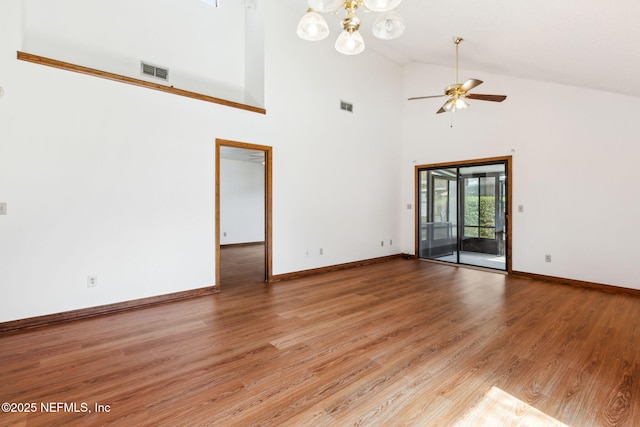 10800 Old St Augustine Rd Unit 301, Jacksonville, FL 32257 - unfurnished room with hardwood / wood-style flooring, ceiling fan with notable chandelier, and high vaulted ceiling
