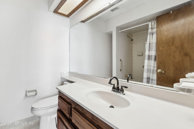 10800 Old St Augustine Rd Unit 301, Jacksonville, FL 32257 - bathroom with vanity, curtained shower, and toilet