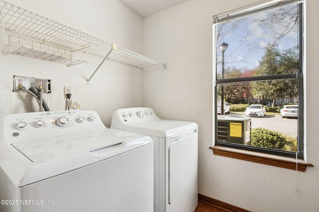 10800 Old St Augustine Rd Unit 301, Jacksonville, FL 32257 - clothes washing area with washing machine and dryer