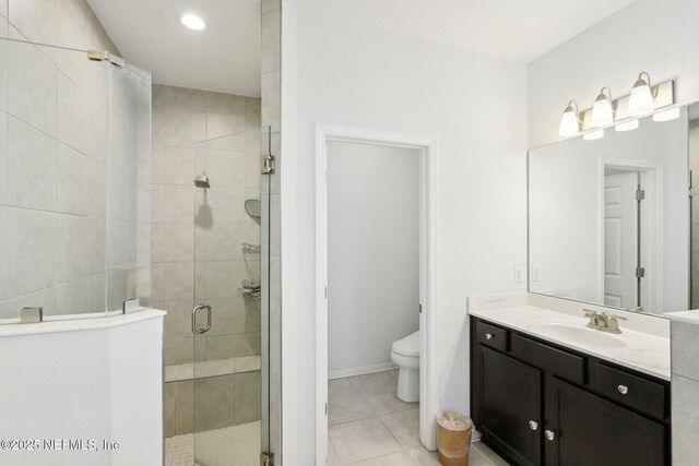 944 Laurel Valley Dr, Orange Park, FL 32065 - full bath featuring vanity, a stall shower, tile patterned flooring, and recessed lighting