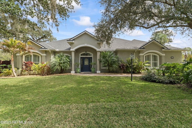 ranch-style house with a front yard