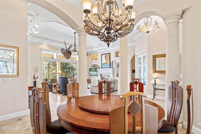 dining room with light tile patterned floors, decorative columns, baseboards, ornamental molding, and a notable chandelier