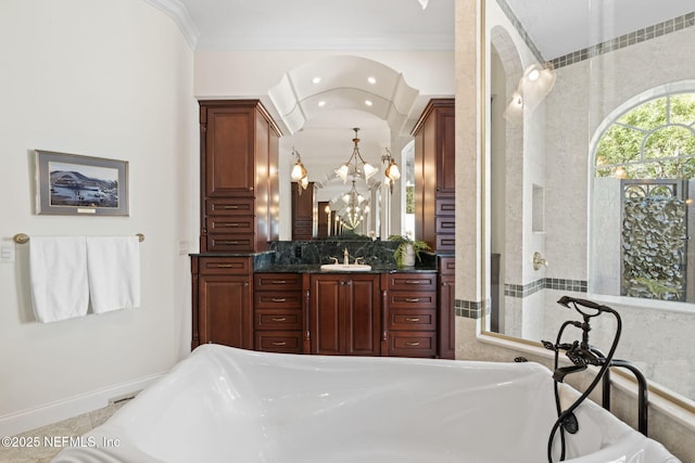 full bathroom with a soaking tub, crown molding, vanity, a notable chandelier, and recessed lighting